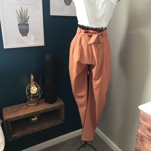High waisted trousers.